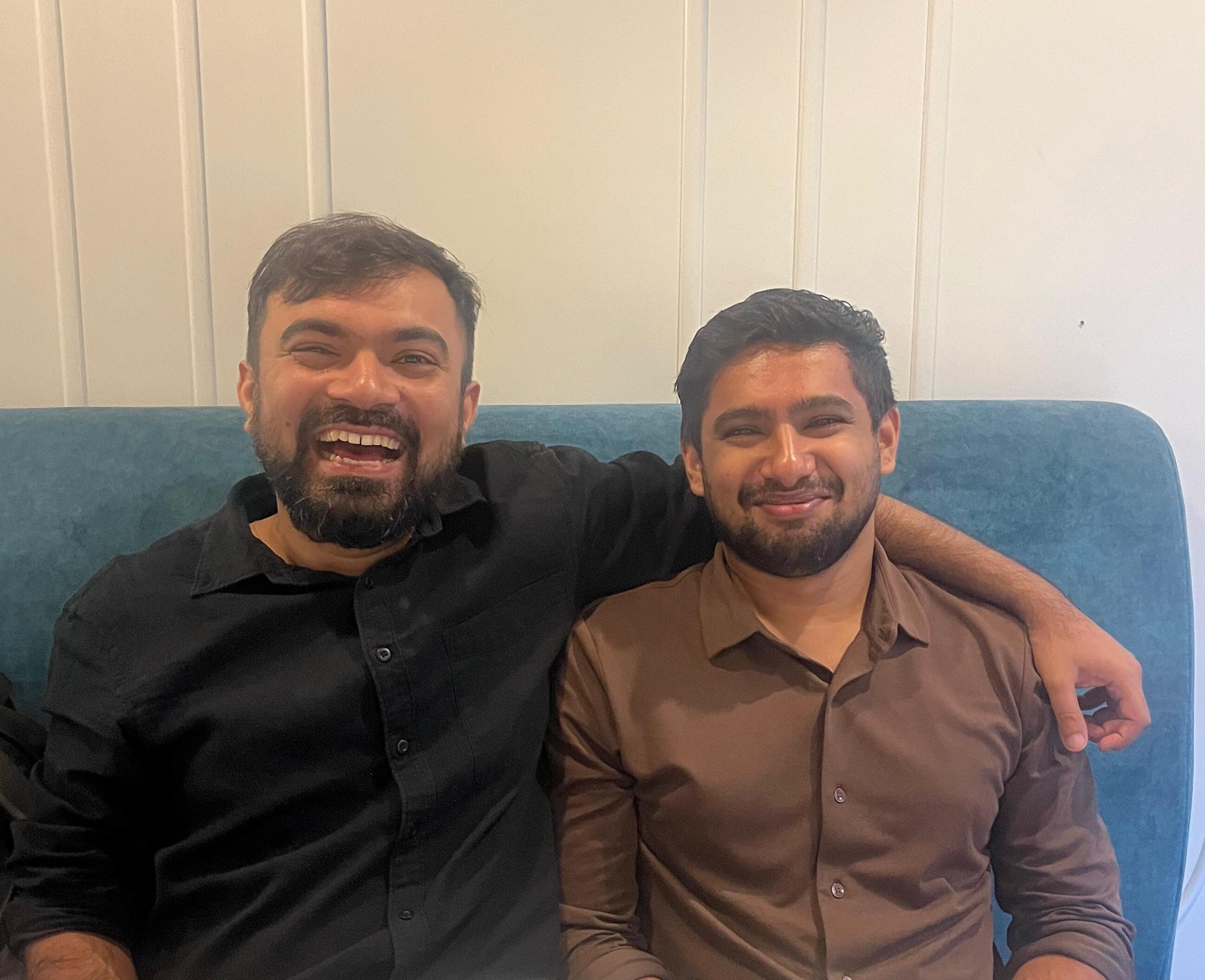 trad founders Sapan Karia and Jayanth Chandra sitting on a sofa